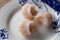 Chinese authentic traditional dish: Cantonese style dumplings Har gow with shrimp, closeup on white and blue plate