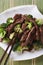 Chinese beef with broccoli closeup. vertical top view