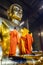 Chinese Buddhist monks dressing golden Buddha Image body