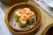 Chinese Cantonese dimsum meal served in bamboo steamer