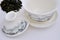 Chinese carving tea cup and raw tea leaf