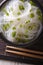 Chinese cellophane noodles close up in a bowl. Vertical top view