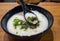 Chinese century egg congee with pork mince