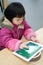 Chinese child playing ipad