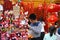 A Chinese child is visiting the new year market