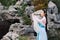 Chinese classic beauty in traditional ancient drama costume stand by rockery