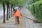 A chinese cleaner is sweeping street