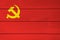 Chinese Communist Party flag color painted on Fiber cement sheet wall background