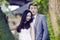 Chinese couple wedding portraint in front of Old trees and old building