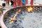 Chinese devotees burning paper offerings during QingMing celebration