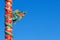 Chinese Dragon on Red Pillar isolated on Blue Sky Background