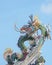 Chinese Dragon statue on the roof.