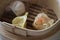 Chinese Dumplings Steaming in Basket