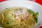 Chinese egg noodles with crab meat in hot soup.