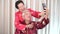 Chinese elder coupl selfie in New Year theme technology to stay connect