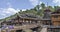 Chinese ethnic minority village, covered bridge and drum to