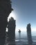 Chinese Fishing Boat Sailing Through Giant Sea Stacks at Night