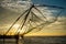 Chinese fishing net at sunrise in Cochin