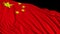 Chinese flag in slow motion. The flag develops smoothly in the wind