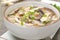 Chinese food - bowl of soup with chicken, shiitake mushrooms