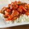Chinese food - sweet and sour chicken on rice
