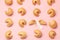 Chinese fortune cookies. Cookies texture pattern with empty blank inside for word prediction. Pink background