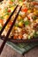 Chinese fried rice with eggs, corn and spices, vertical