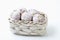 Chinese garlic bulbs in basket on white background