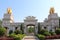 Chinese Gate with emblem of bird and two golden elephants sculptures on top