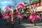 Chinese Girls with Pink Fans Perform in Vancouver, Chinatown New Years Parade