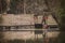 Chinese gondola, wooden sampan boat with red lanterns parked at jetty