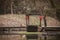 Chinese gondola, wooden sampan boat with red lanterns parked at jetty