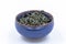 Chinese Green tea. Huang Shan Mao Feng in a blue ceramic bowl