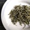 Chinese green tea leaves in small plate