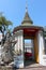 Chinese guardian figure beside a gate, Wat Pho, in Bangkok, Thailand