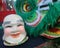 Chinese healthy man smiling mask and Chinese lion mask