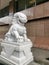 A Chinese inspired lion made from marble stone in Chinatown, Port-of-Spain, Trinidad and Tobago.