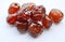 Chinese jujube candy coating syrup on white background