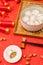 Chinese Lantern Festival traditional cuisine peanut dumplings on red background