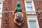 Chinese lion or colorful dragon on the red brick wall at Chinatown in Soho Central London for the New Year celebrations on Wardour