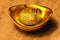 Chinese lucky gold ingot on calligraphy backgr