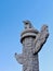 Chinese marble carved columns Huabiao against a clear blue sky.