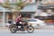 Chinese middel aged man ona motorcycle, Yiwu, China