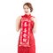 chinese new year. asian woman showing the red couplets