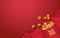 Chinese New Year celebration background with red envelope loaded with Chinese golden ingot, money coin and paper fan