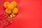 chinese new year concept with red envelope orange and gold on red background(non english text is GONG XI FA CAI
