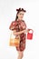 Chinese New Year concept, Woman holding a basket of food and red basket ,meaning to be happy healthy and wealthy year, Chinese New