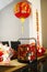 Chinese New Year decorations and cards on glass table. Decorative background design