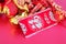 Chinese New Year decorations and New Year red envelopes.The Chinese characters in the picture mean `happiness` and `good luck`