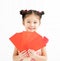 Chinese new year. little girls holding red envelope